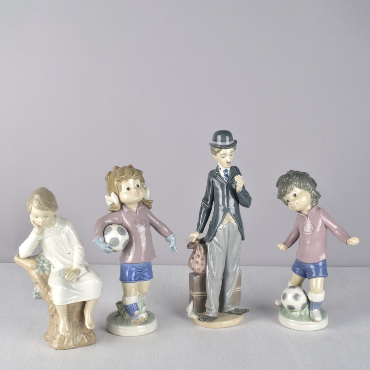 Lladro Glazed Porcelain Figurines