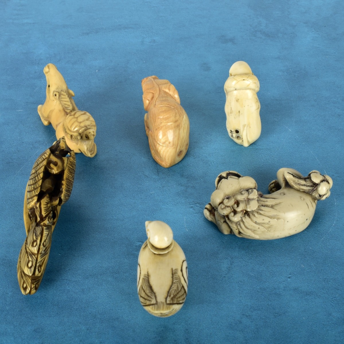 Six Japanese Polychromed Carved Netsuke's