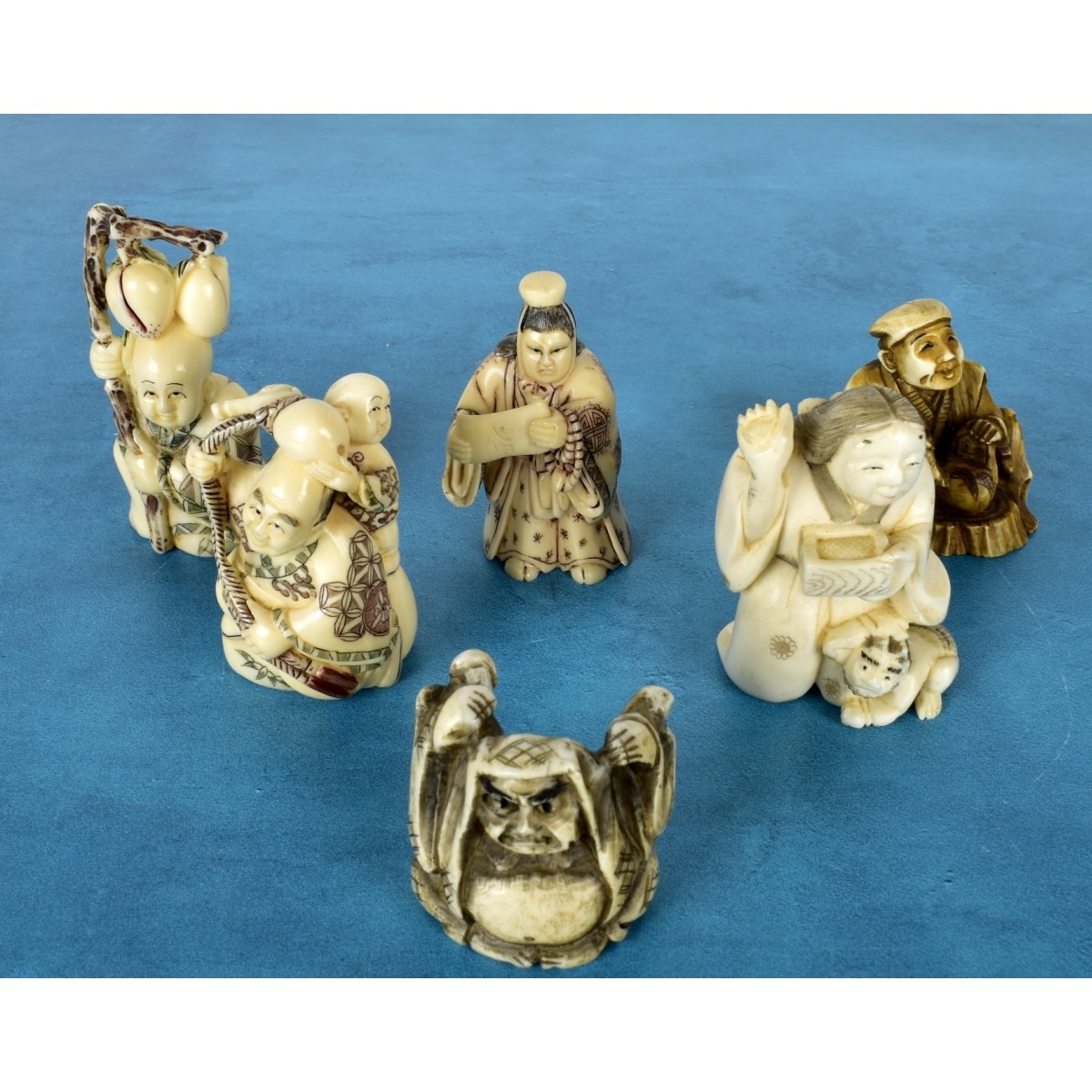 Six Japanese Polychromed Carved Netsuke's