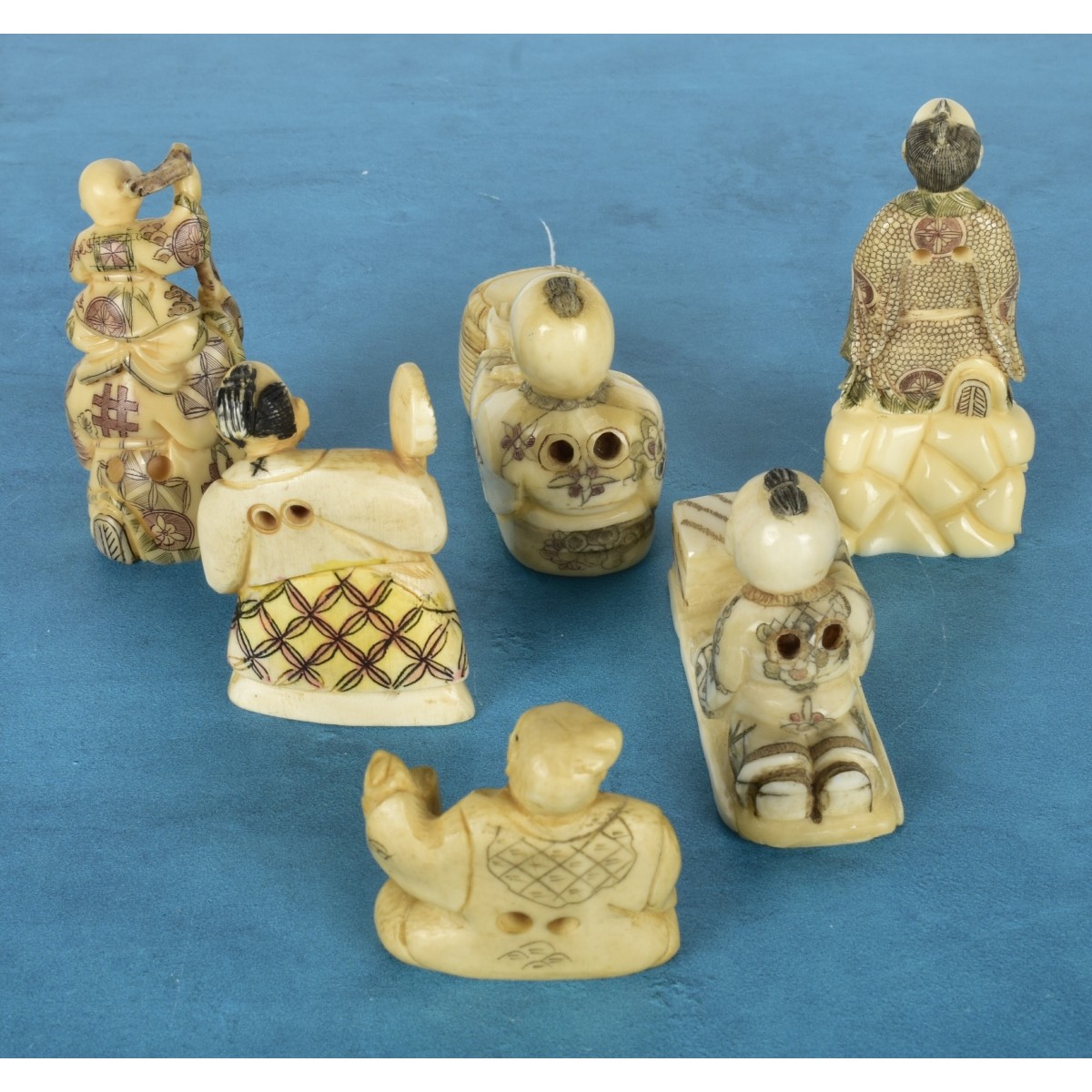 Six Antique Japanese Polychromed Carved Netsuke's