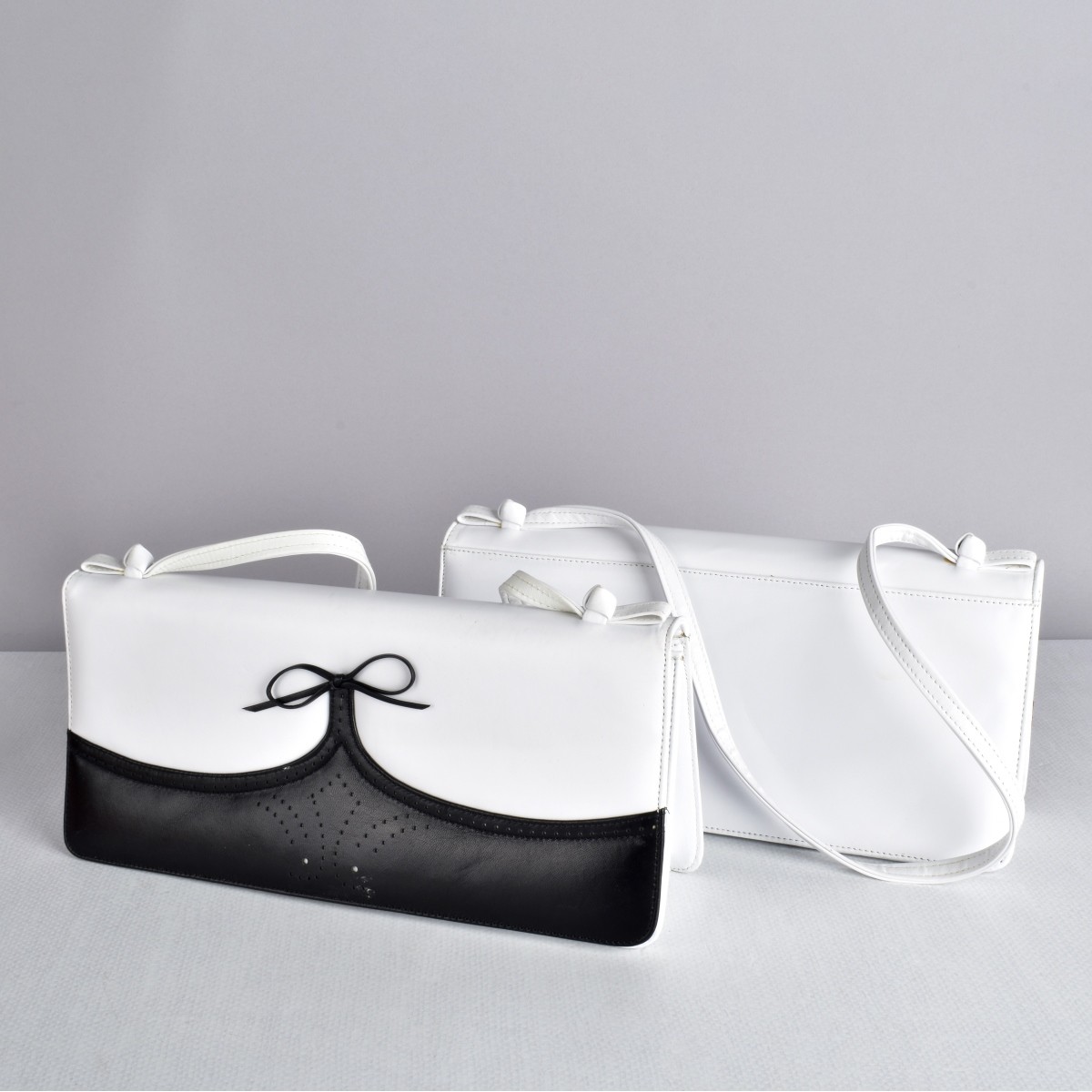 Three Carlos Falchi Designer Handbags