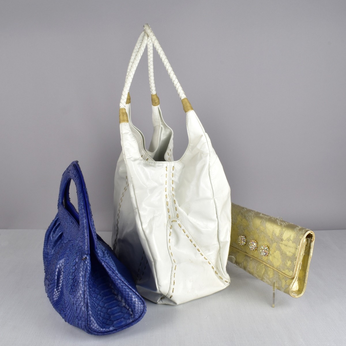 Three Carlos Falchi Designer Handbags