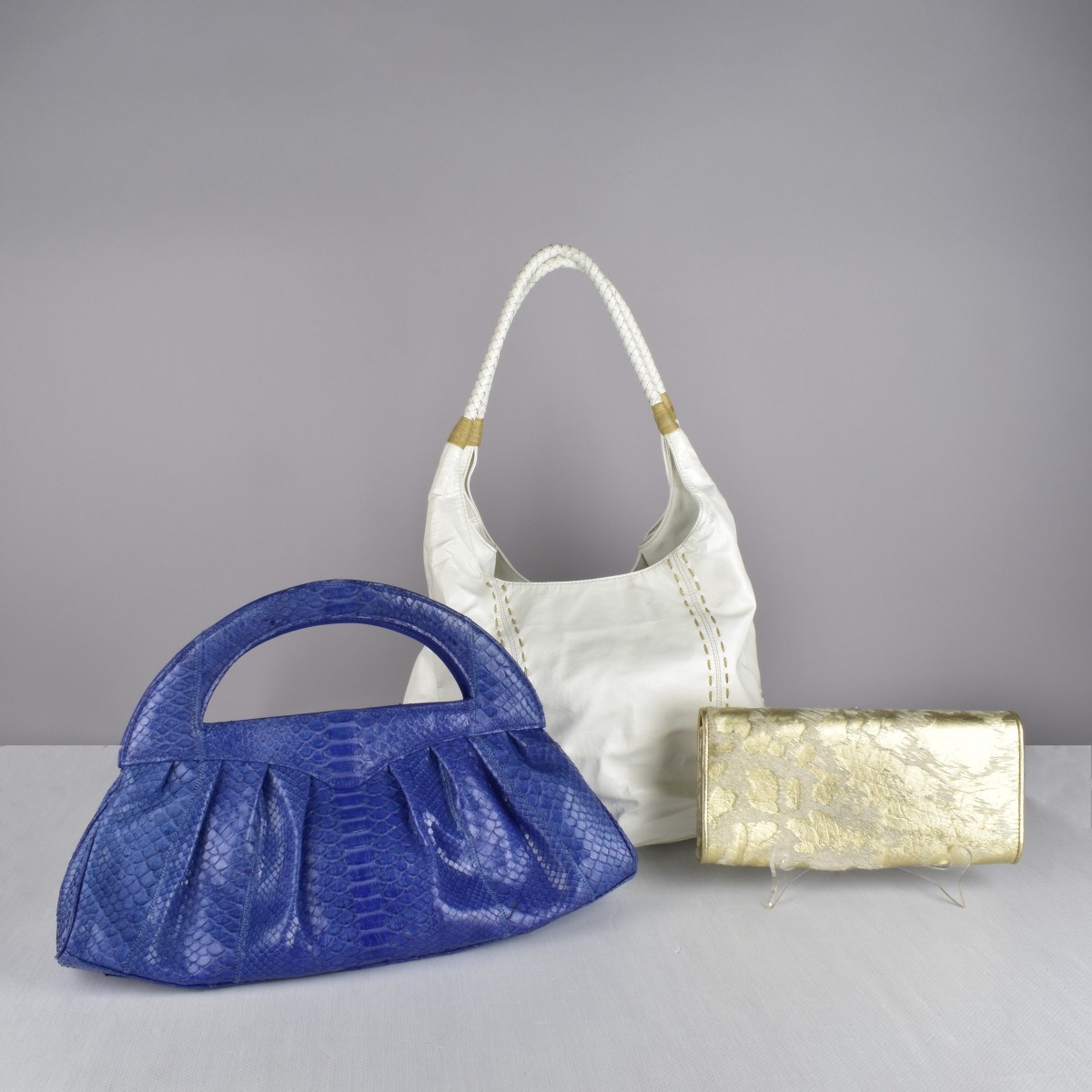 Three Carlos Falchi Designer Handbags