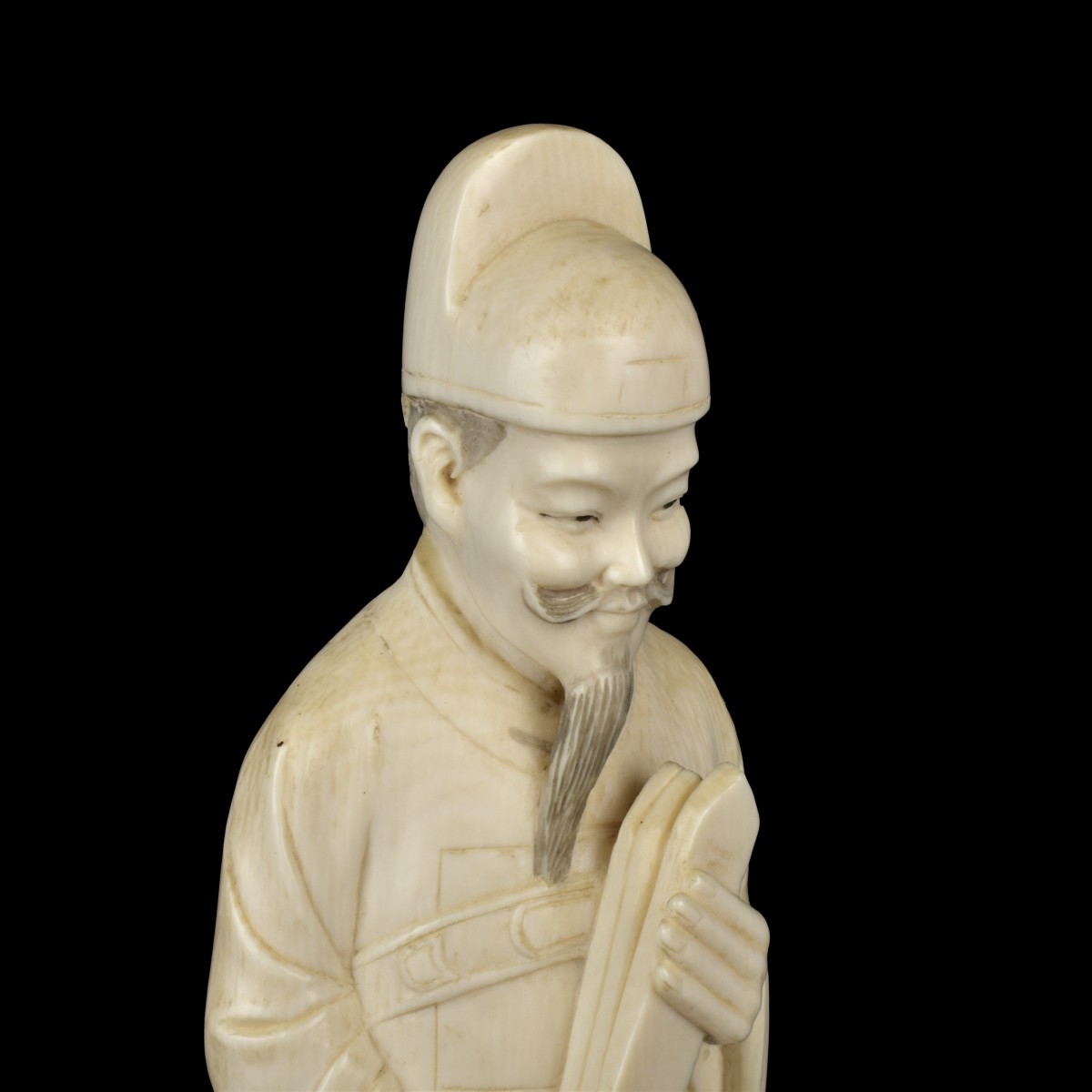 Antique Carving of a Scholar