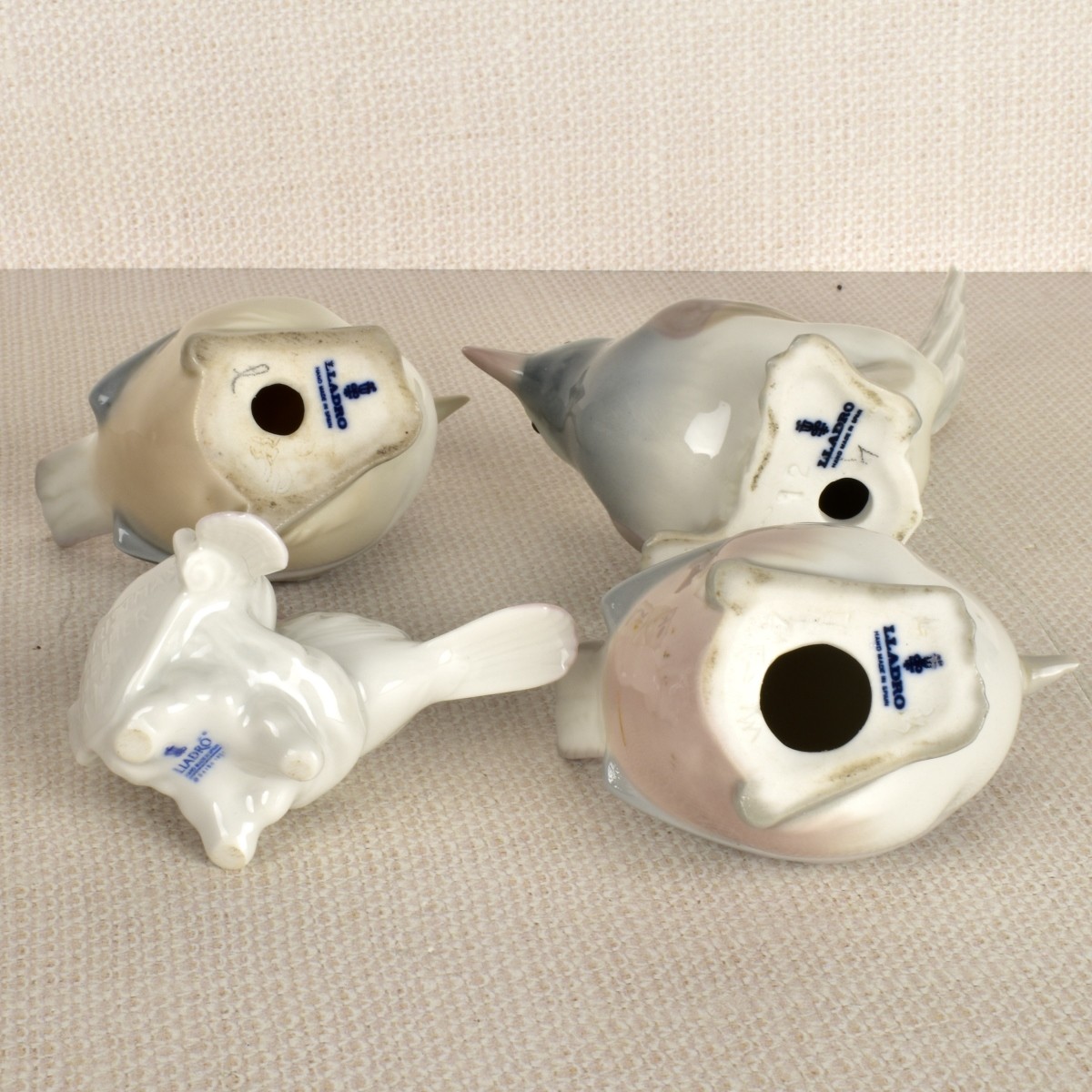 Four Lladro Porcelain Bird Figurines