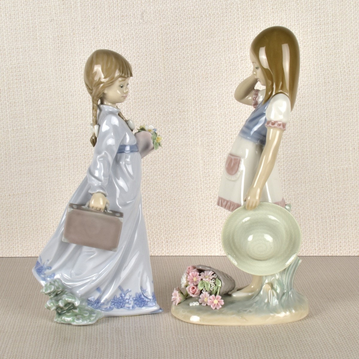 Two Lladro Porcelain Girls with Flowers