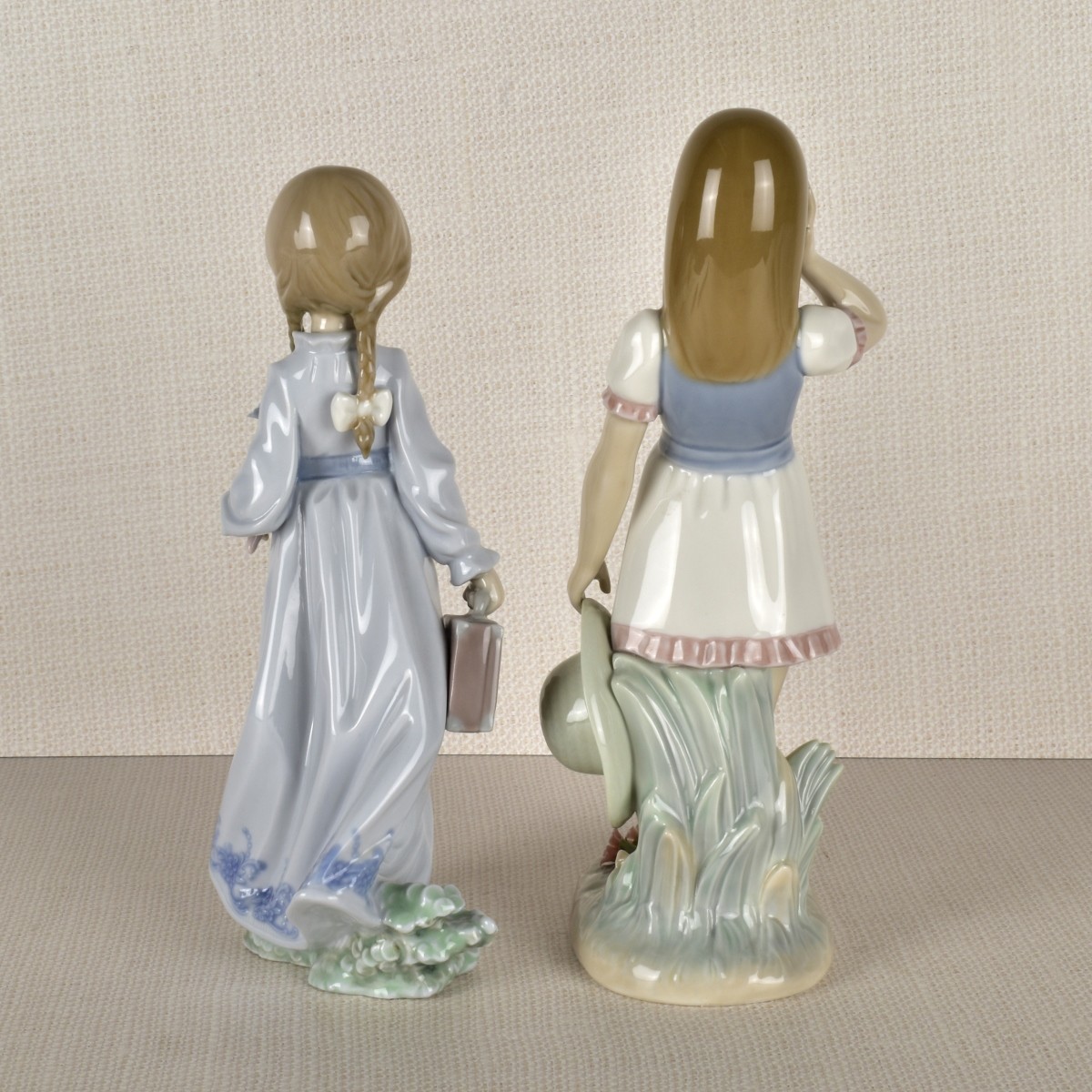 Two Lladro Porcelain Girls with Flowers