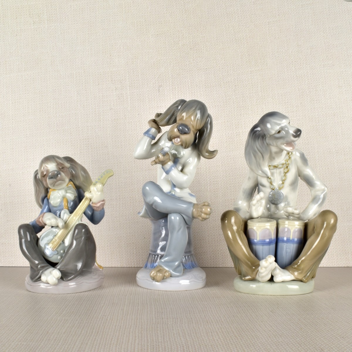 Three Lladro Porcelain Dog Band Figurines