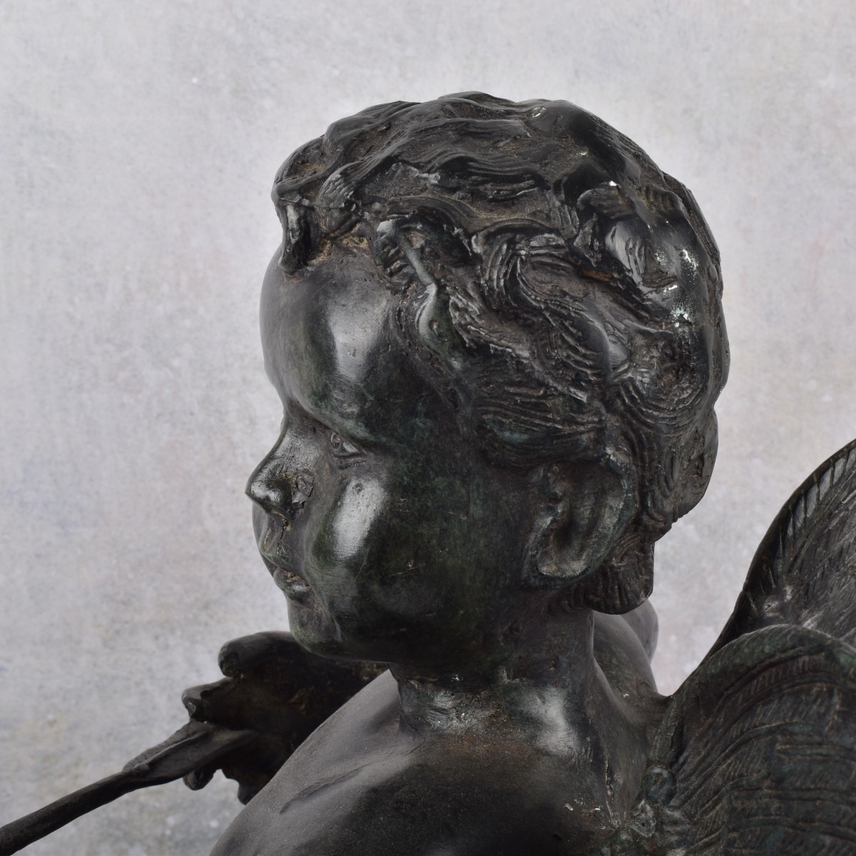 Bronze Cupid Figure