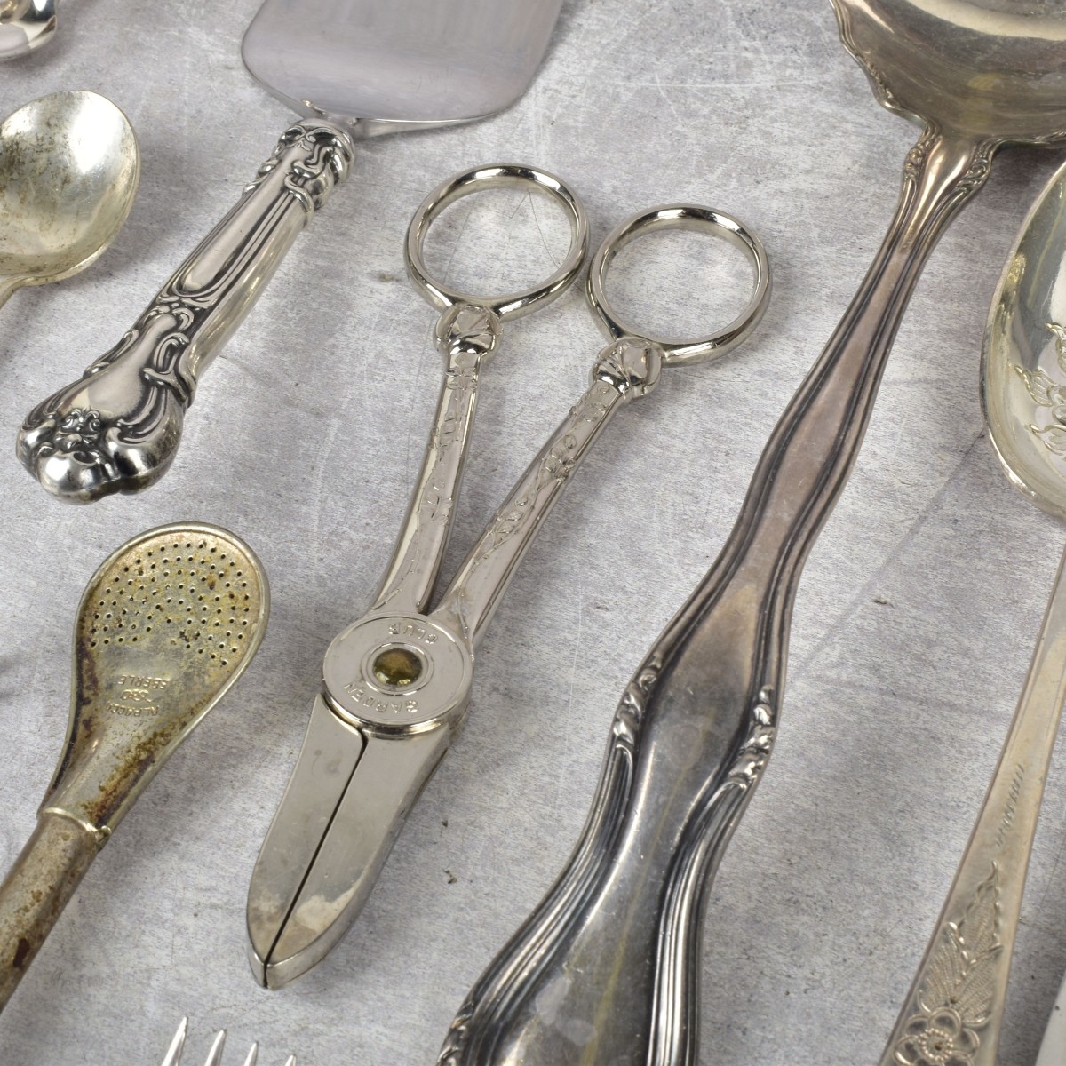 Large Assortment of Silver Plate and MOP