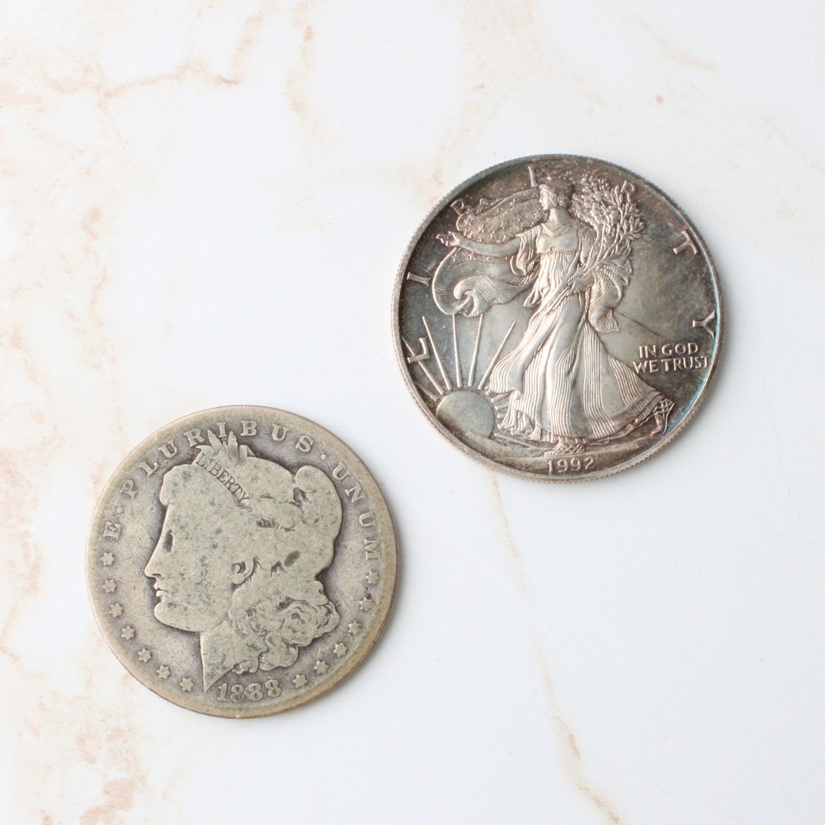 Two US Silver Dollar Coins