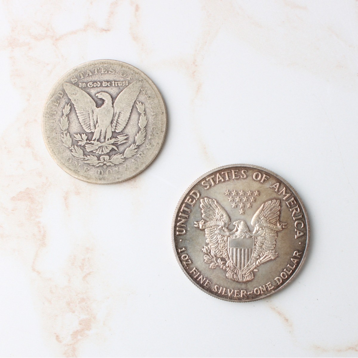 Two US Silver Dollar Coins