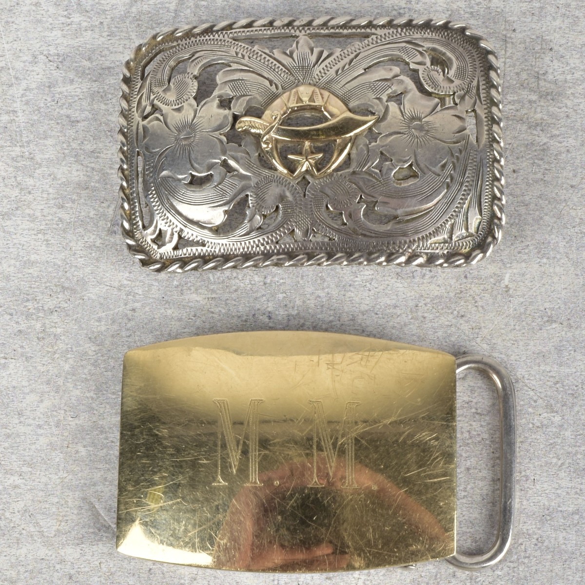 Sterling Silver and Gold Belt Buckles