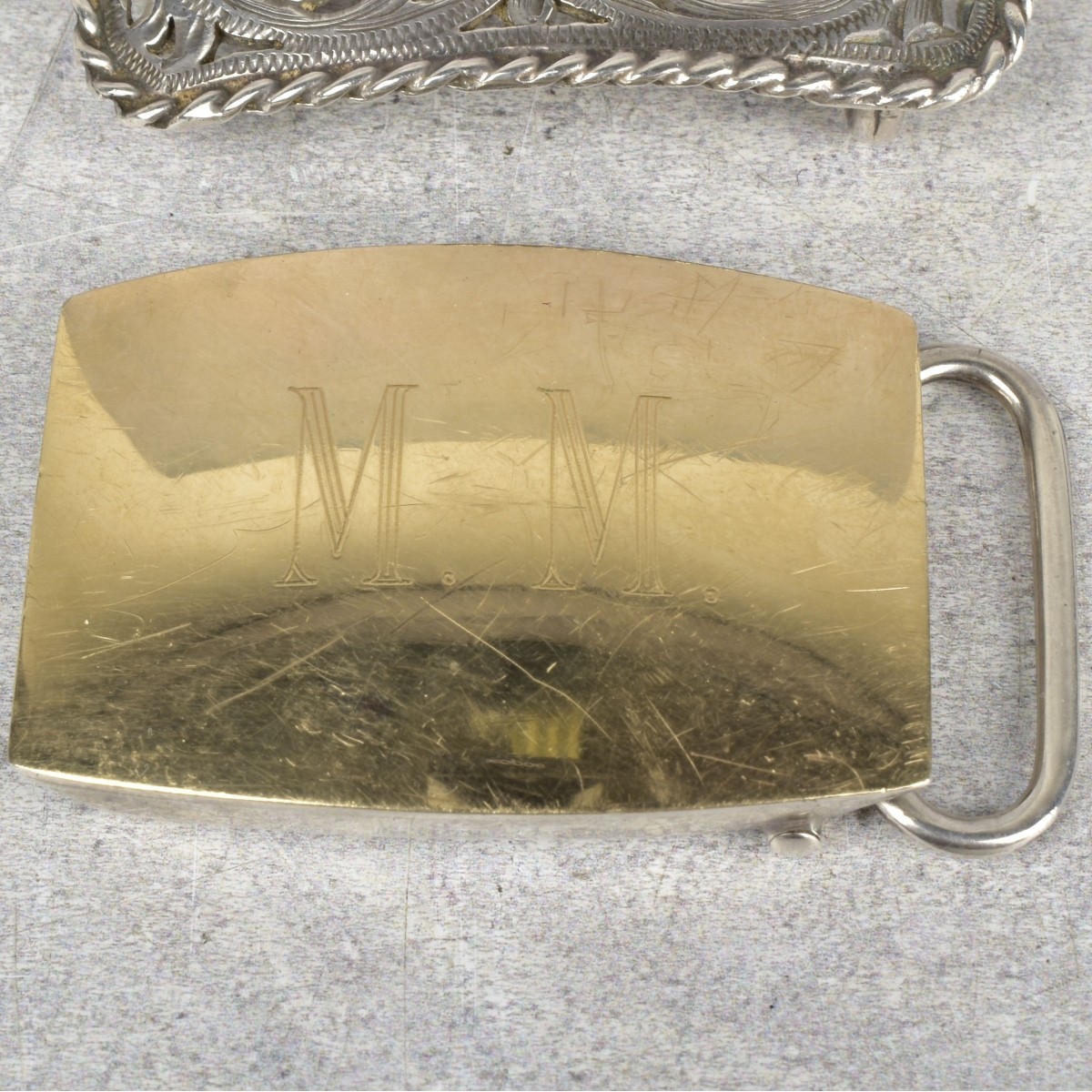 Sterling Silver and Gold Belt Buckles