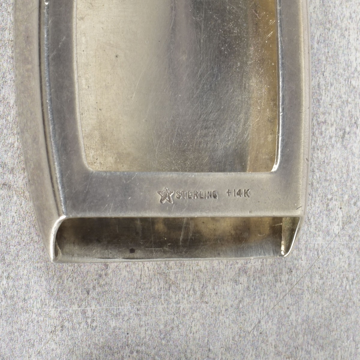 Sterling Silver and Gold Belt Buckles