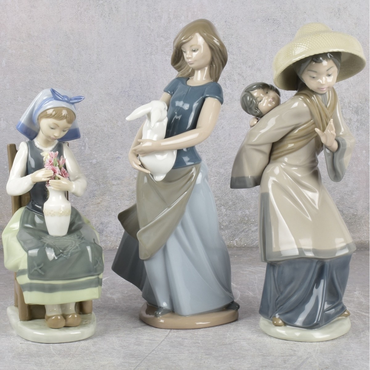 Lladro and Nao Gloss Porcelain Sculptures