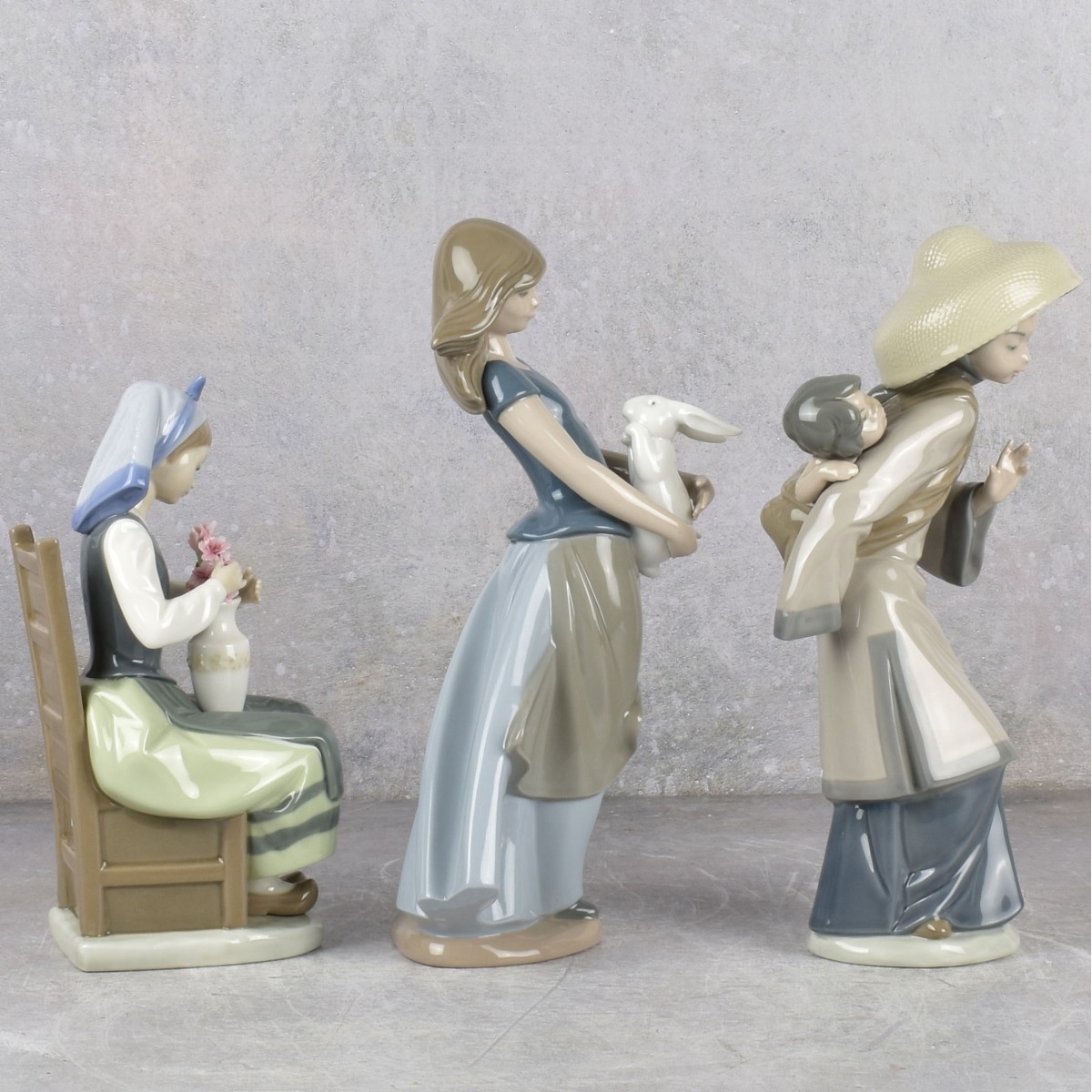 Lladro and Nao Gloss Porcelain Sculptures