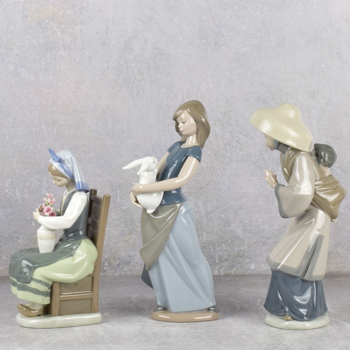 Lladro and Nao Gloss Porcelain Sculptures