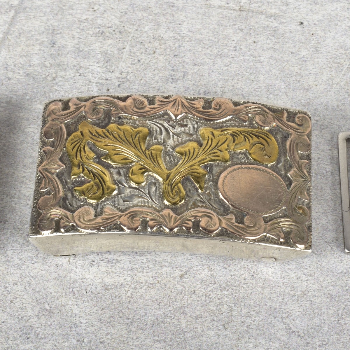 Sterling Silver and Gold Belt Buckles