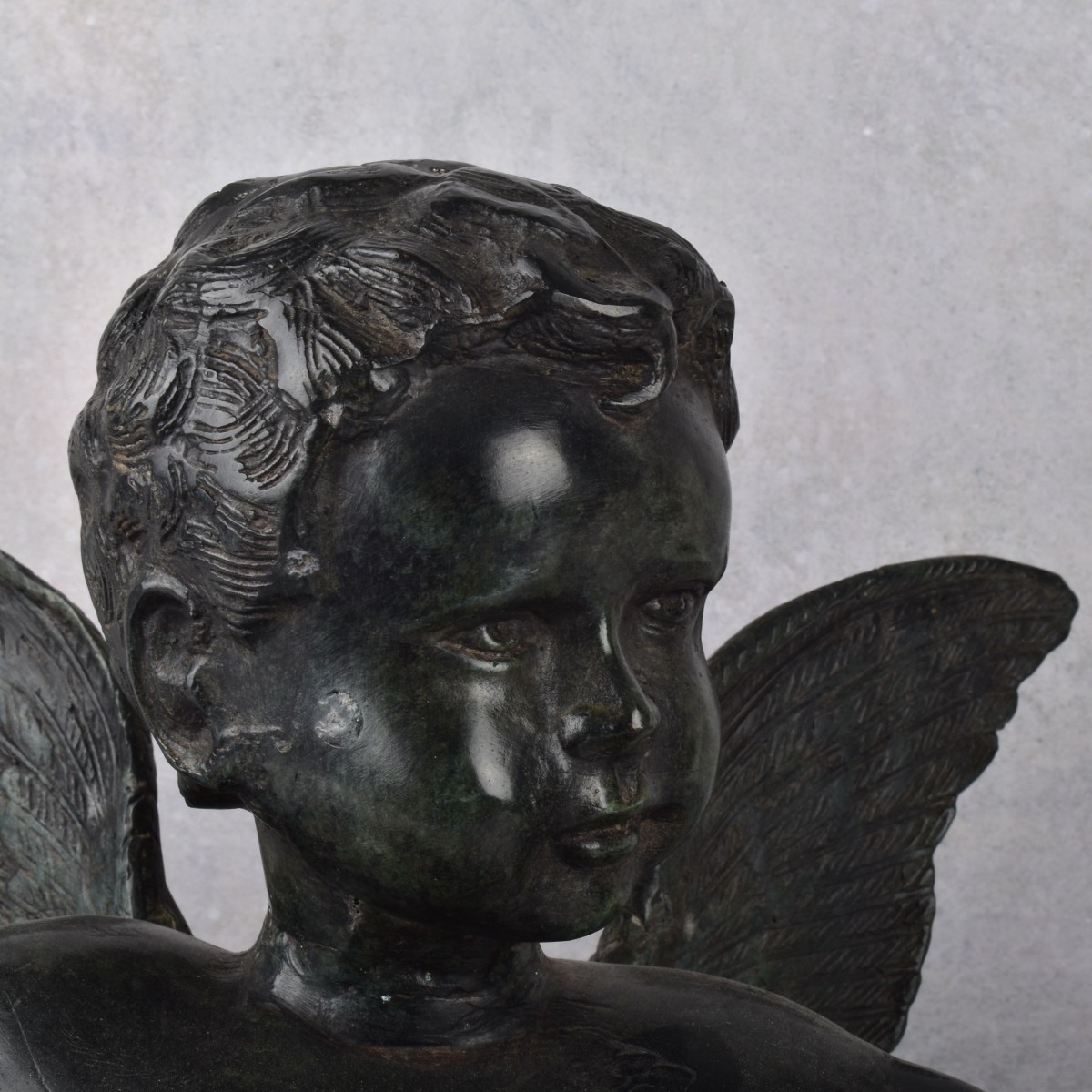 Bronze Cupid Figure