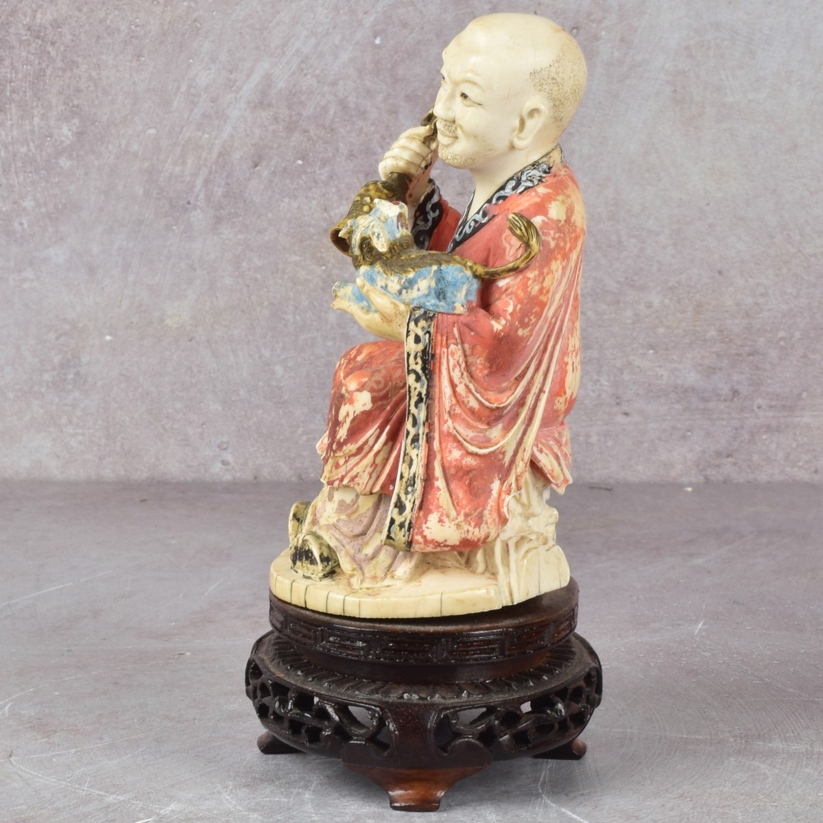 Chinese Carving of a Seated Man