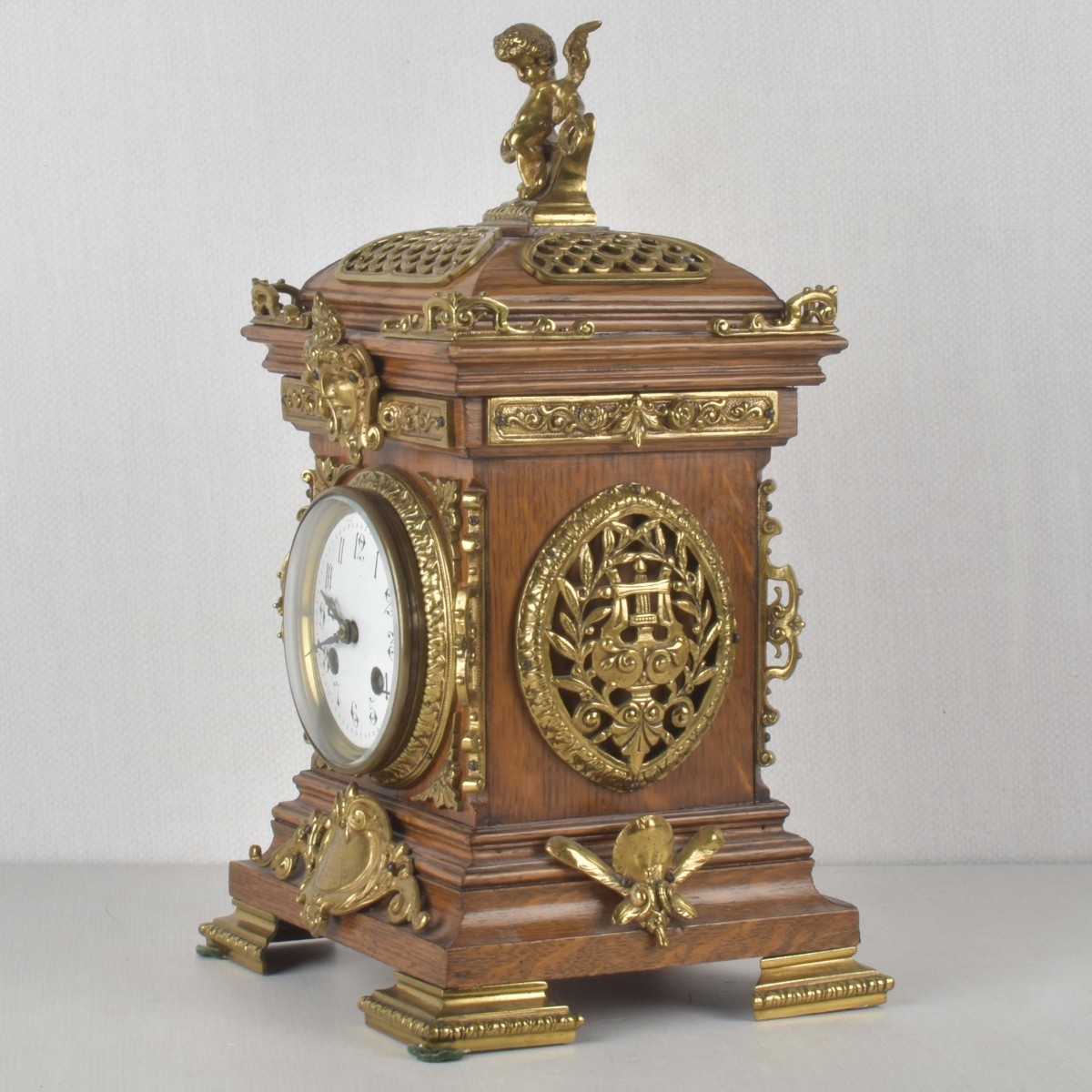 19 C. French Oak and Gilt Brass Mantle Clock