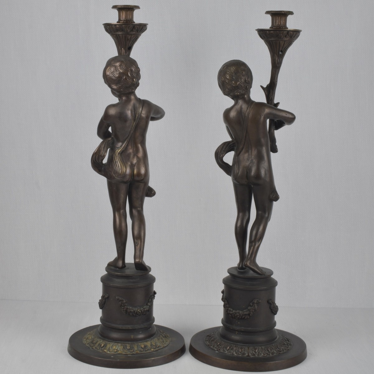 Pair of Bronze Figural Candlesticks