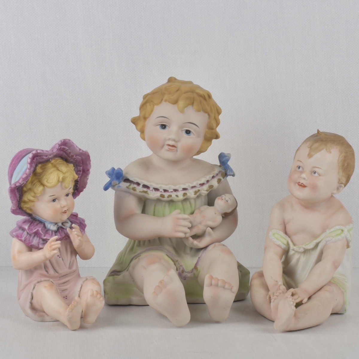 Porcelain Bisque Piano Babies