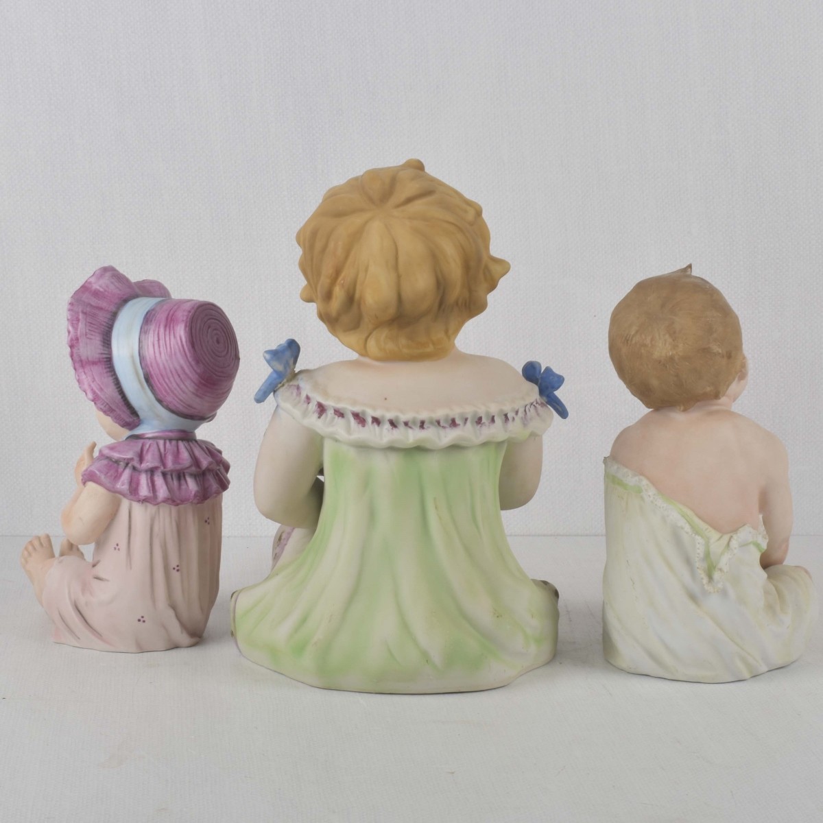 Porcelain Bisque Piano Babies