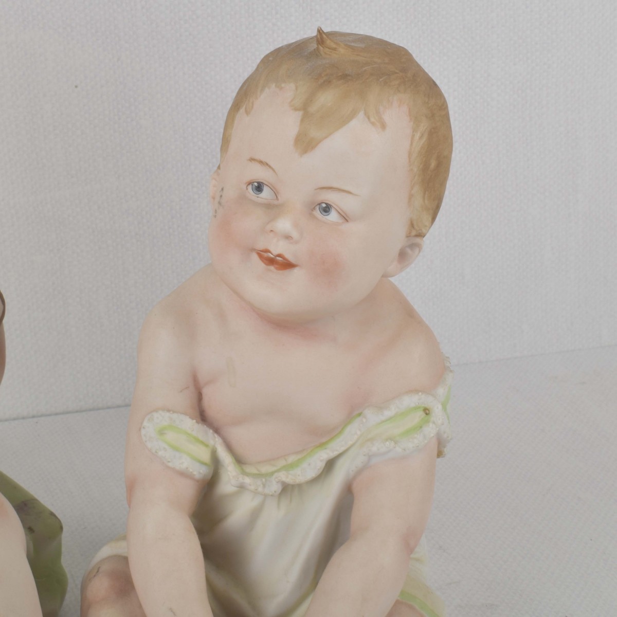 Porcelain Bisque Piano Babies