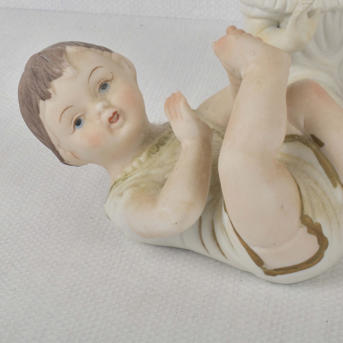 Porcelain Bisque Piano Babies
