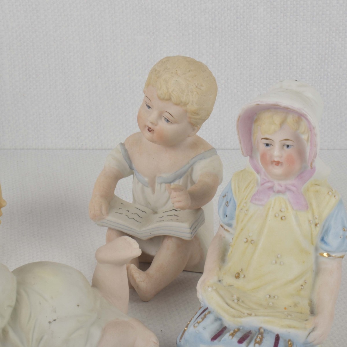 Porcelain Bisque Piano Babies