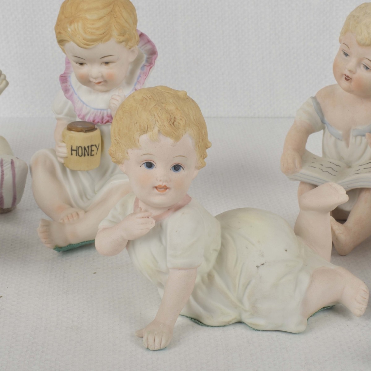 Porcelain Bisque Piano Babies