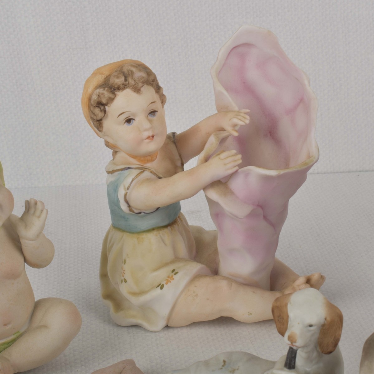 Porcelain Bisque Piano Babies