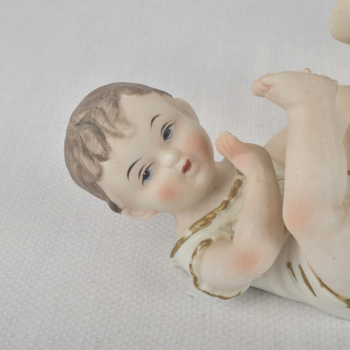 Porcelain Bisque Piano Babies