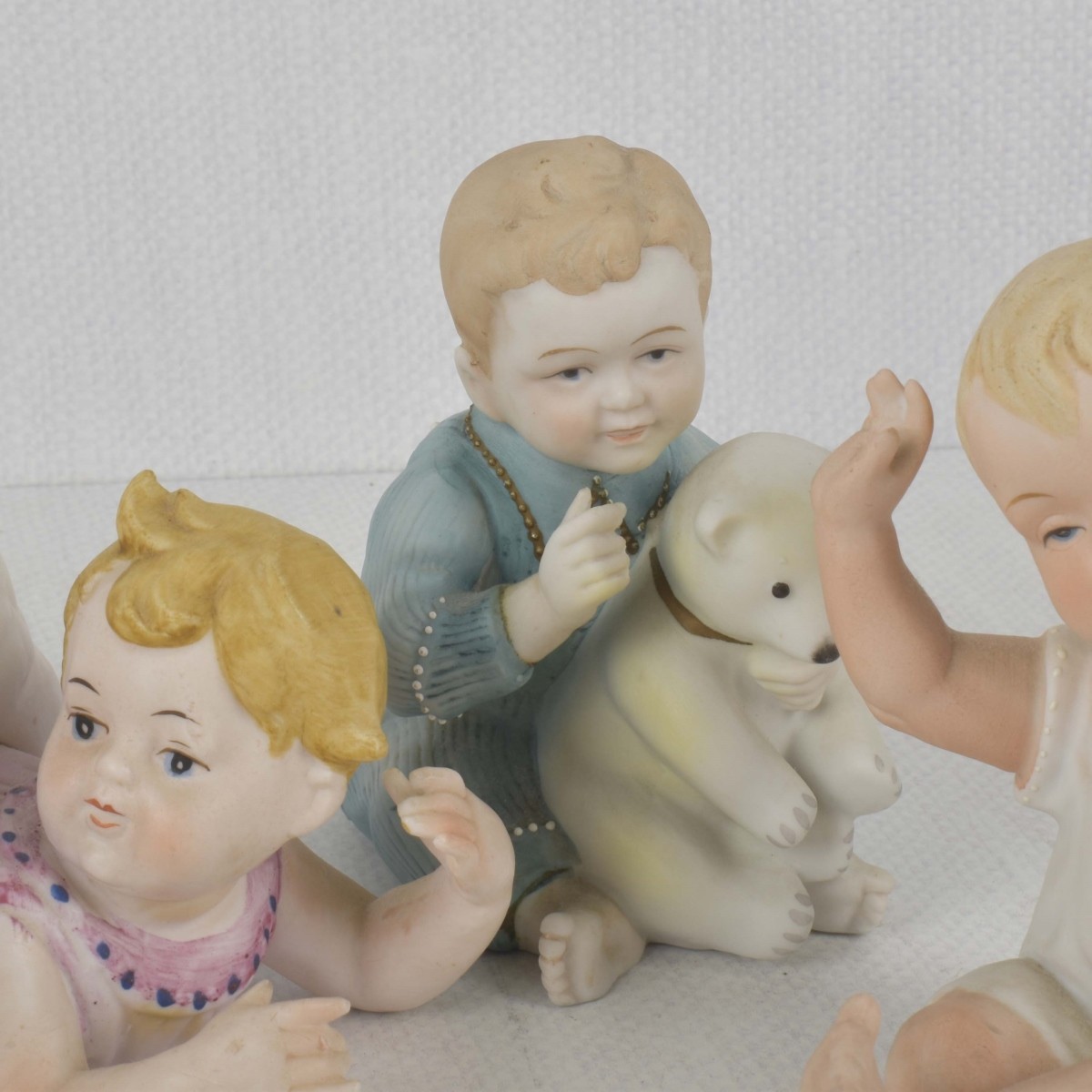 Porcelain Bisque Piano Babies