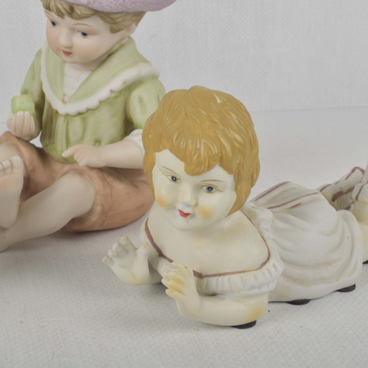 Porcelain Bisque Piano Babies
