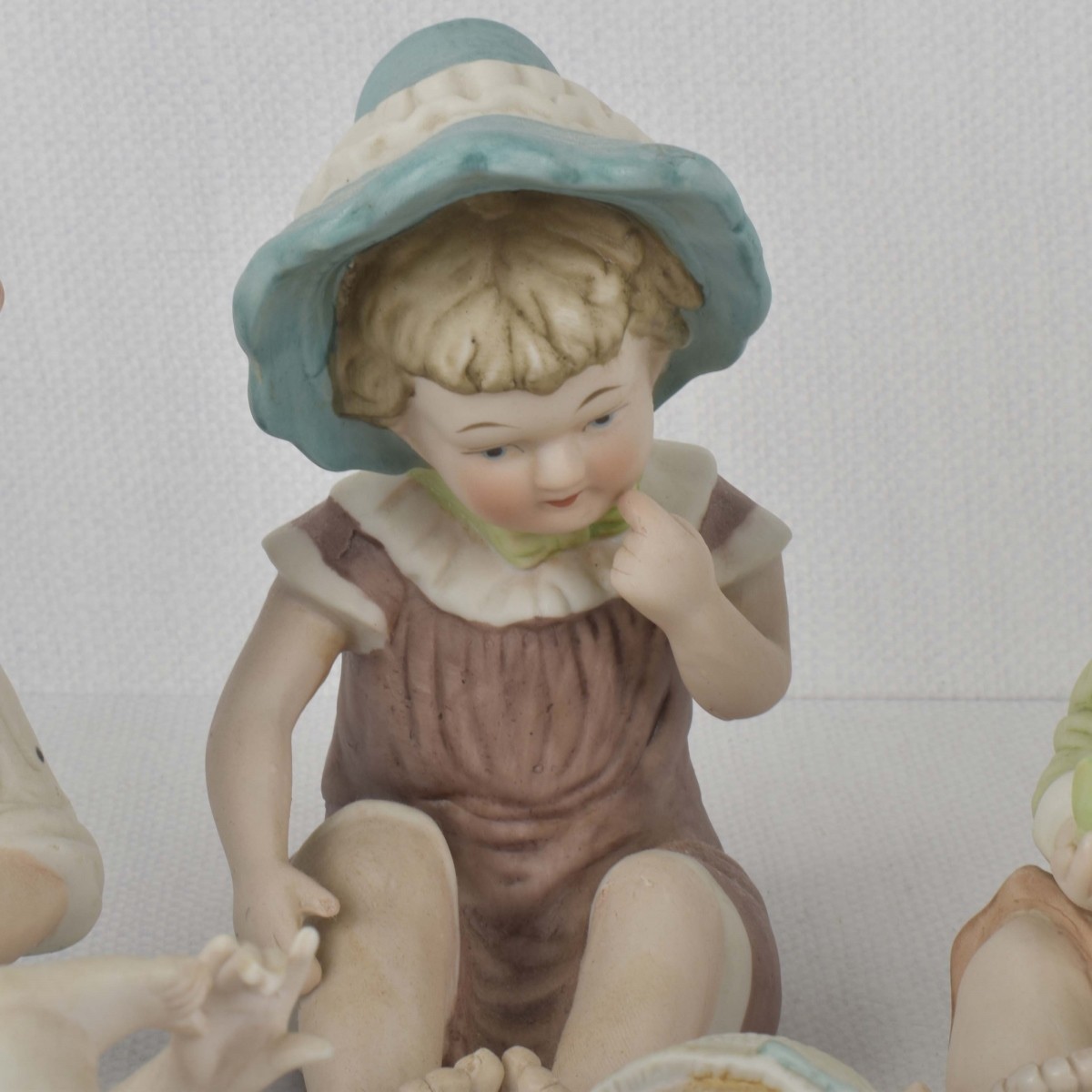 Porcelain Bisque Piano Babies