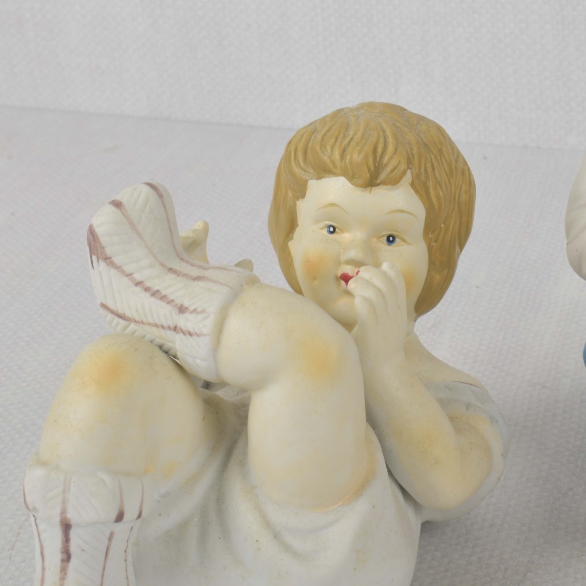 Porcelain Bisque Piano Babies