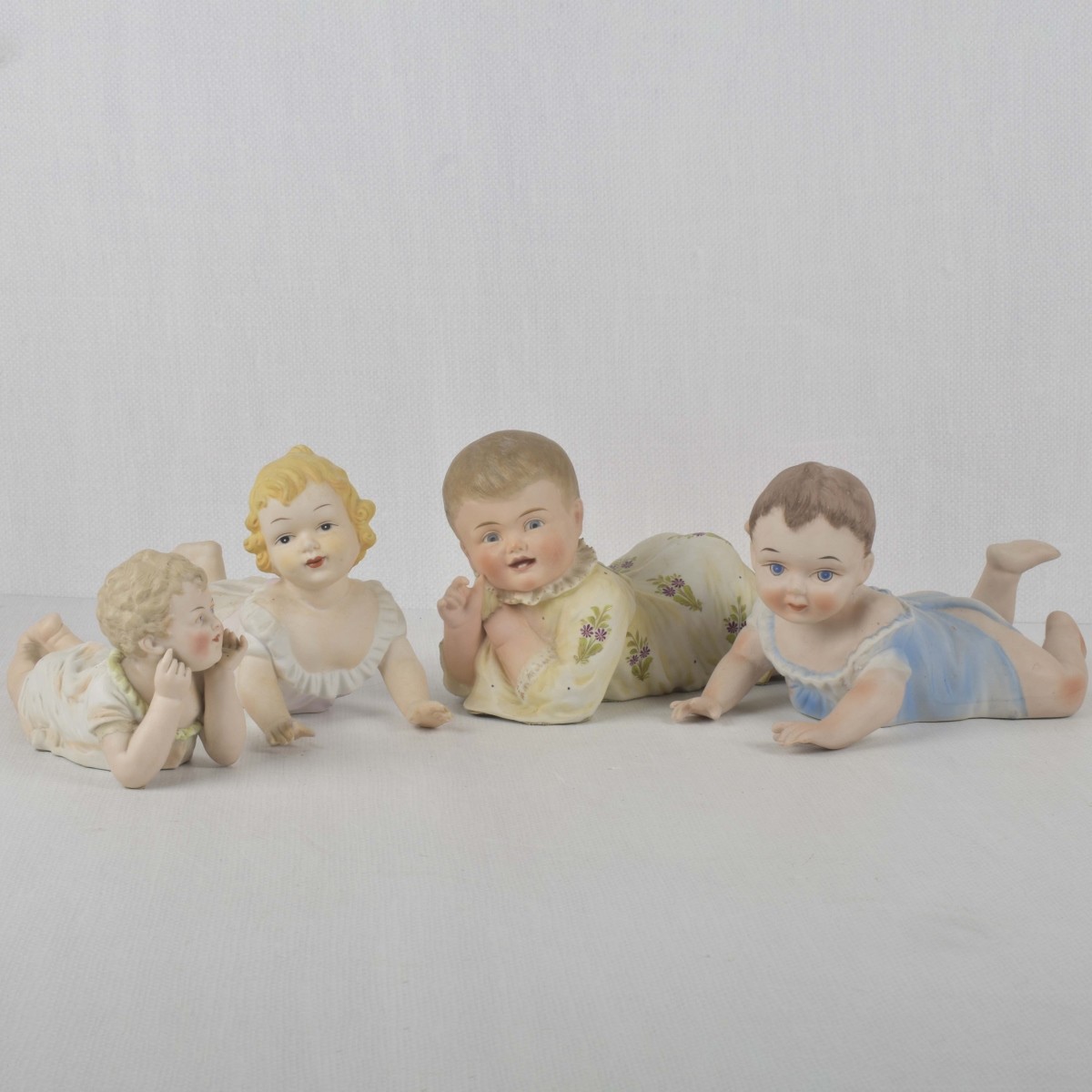 Porcelain Bisque Piano Babies