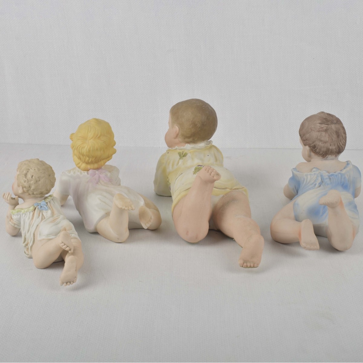 Porcelain Bisque Piano Babies